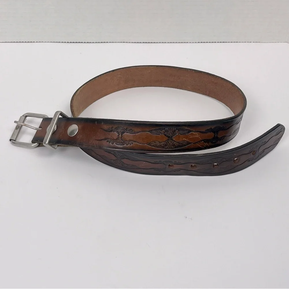 Brown tooled leather belt, unisex, approximately 34” see measurements in photos.